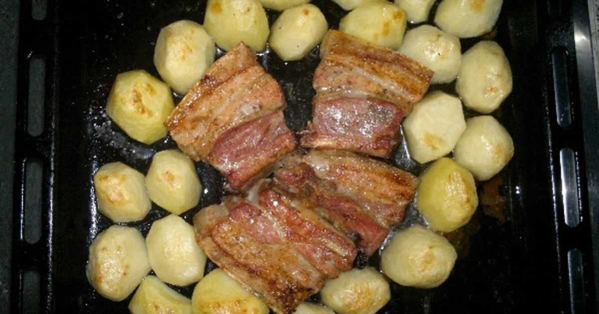 Свиные рёбрышки с картошкой в духовке — простые и вкусные рецепты