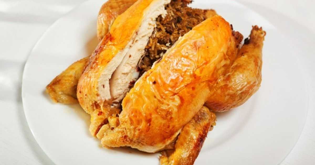 Фаршированная курица в духовке: рецепты приготовления тушки целиком