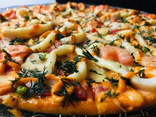 Рецепт приготовления пиццы с морепродуктами в домашних условиях